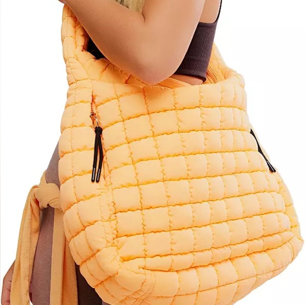 FP Movement Quilted Carryall Bag
 Neon Clementine-